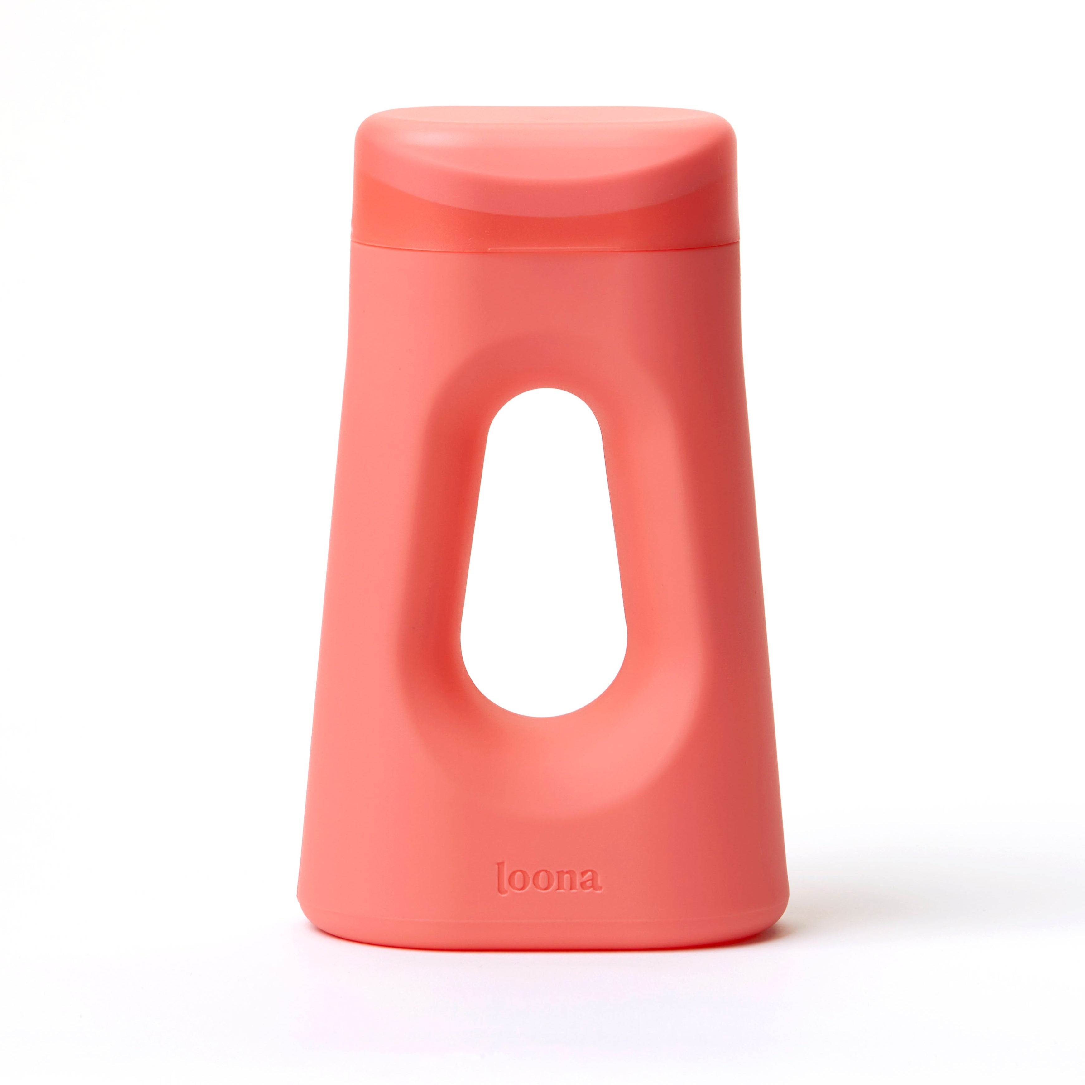 The Loona Female Urinal shown in coral dream color The Loona Female Urinal shown in coral dream color