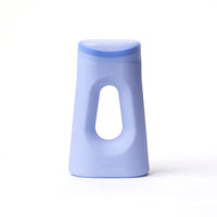 The Loona Female Urinal personal handheld portable bedside urinal shown in Loona Blue color